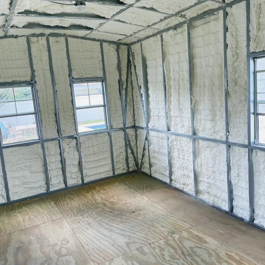Closed-cell spray foam insulation applied to wall cavities in a residential project in Millstone